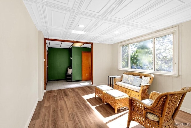 10652 Elm St, North Collins, NY 14111 - sitting room featuring baseboards and light wood-style flooring