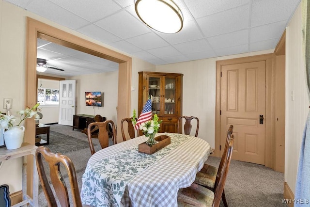 10652 Elm St, North Collins, NY 14111 - dining space featuring carpet and a paneled ceiling