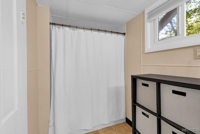 10652 Elm St, North Collins, NY 14111 - bathroom with tile patterned floors and curtained shower