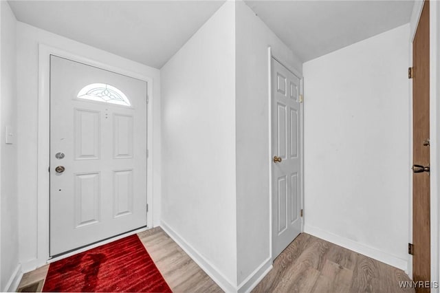 8 Robin Rd, Amherst, NY 14228 - foyer entrance featuring light wood finished floors and baseboards