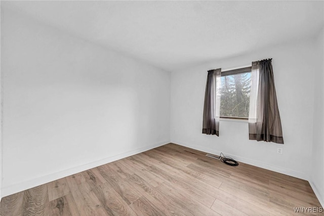 8 Robin Rd, Amherst, NY 14228 - empty room featuring wood finished floors and baseboards