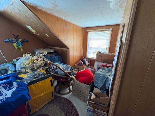 106 Rexford St, Rochester, NY 14621 - misc room featuring wood walls and carpet floors