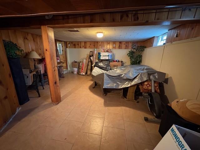 106 Rexford St, Rochester, NY 14621 - basement featuring wood walls