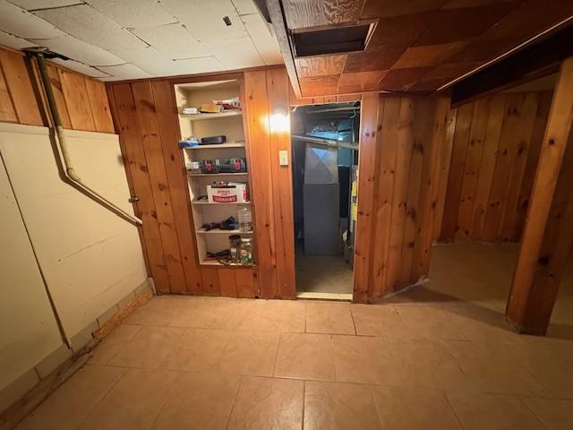 106 Rexford St, Rochester, NY 14621 - unfinished basement featuring wooden walls