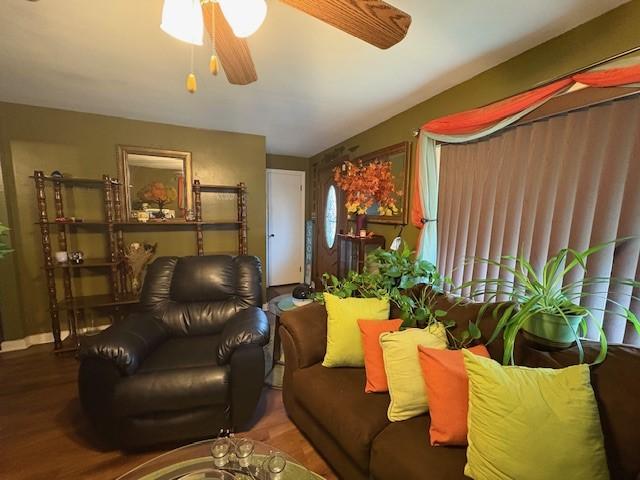 106 Rexford St, Rochester, NY 14621 - living room featuring a ceiling fan and wood finished floors