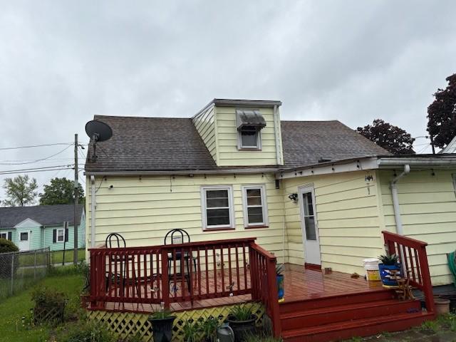 106 Rexford St, Rochester, NY 14621 - back of house featuring a wooden deck and roof with shingles