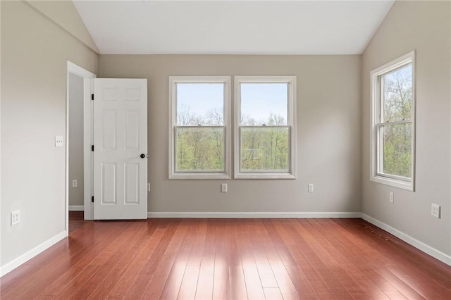 2779 Maricle Rd, Freetown, NY 13040 - unfurnished room featuring vaulted ceiling, wood-type flooring, and baseboards