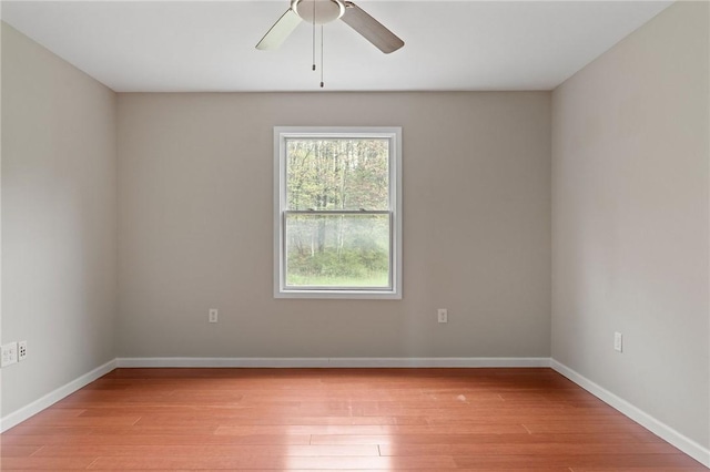 2779 Maricle Rd, Freetown, NY 13040 - unfurnished room with ceiling fan, light wood-style floors, and baseboards
