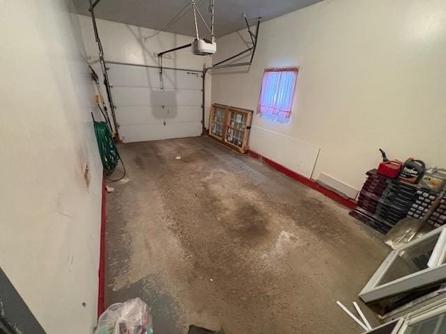 245 Weaver St, Rochester, NY 14621 - garage featuring a garage door opener and french doors
