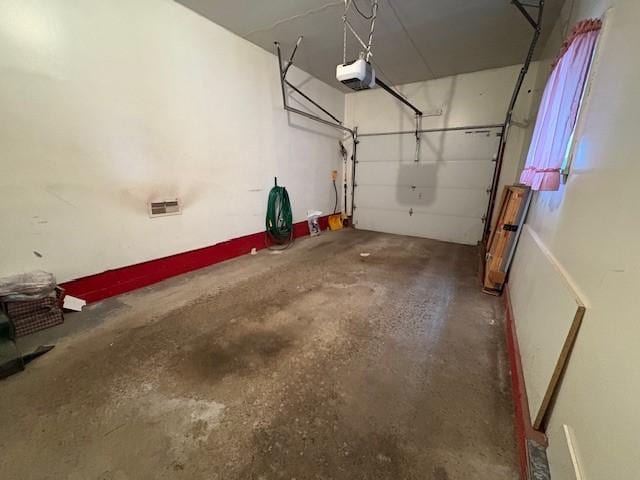 245 Weaver St, Rochester, NY 14621 - garage featuring a garage door opener