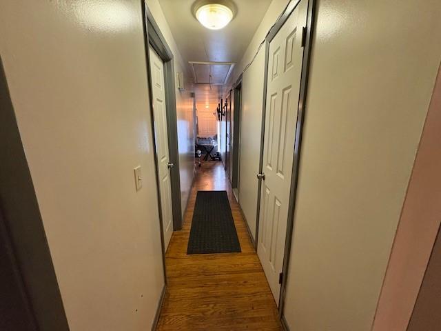 245 Weaver St, Rochester, NY 14621 - hallway with attic access and wood finished floors