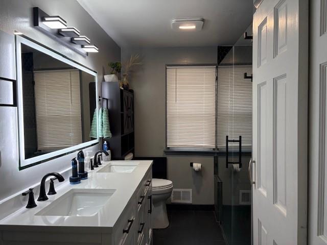 245 Weaver St, Rochester, NY 14621 - bathroom with double vanity and toilet