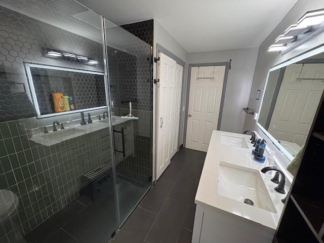245 Weaver St, Rochester, NY 14621 - bathroom with double vanity and a stall shower