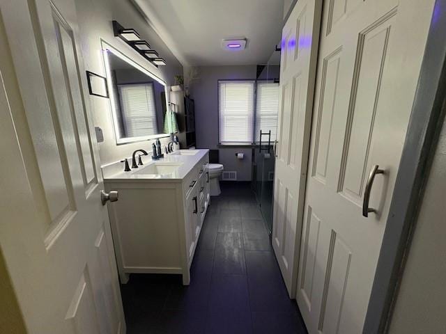 245 Weaver St, Rochester, NY 14621 - full bathroom featuring toilet, vanity, and tile patterned flooring