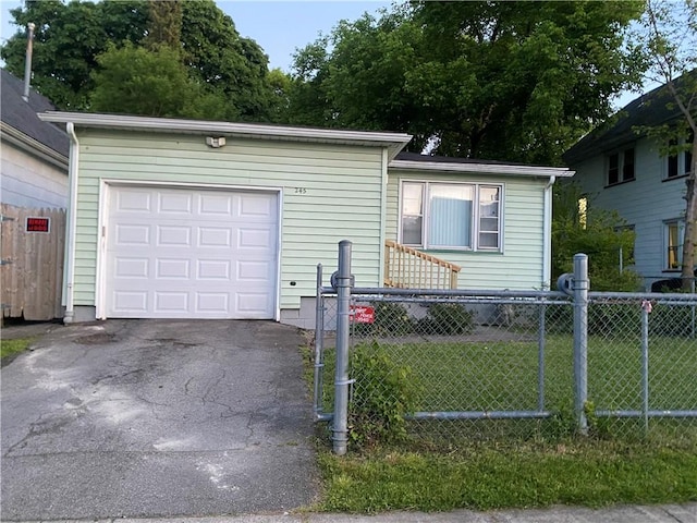 245 Weaver St, Rochester, NY 14621 - view of front of home with driveway and a garage