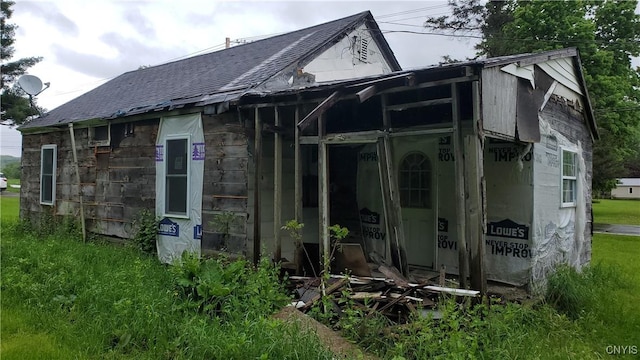 1043 State Highway 26, Pitcher, NY 13124 - rear view of house featuring a shingled roof