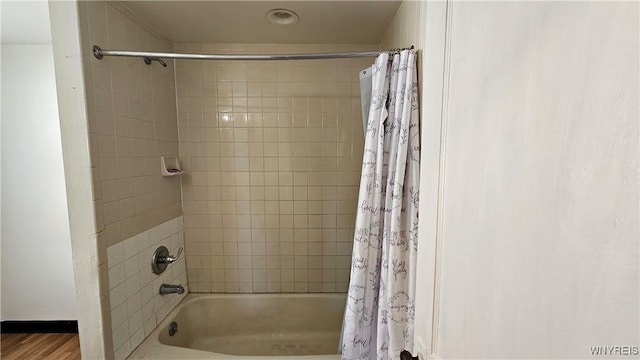 341 Dartmouth Ave, Buffalo, NY 14215 - full bath featuring shower / bath combination with curtain and wood finished floors