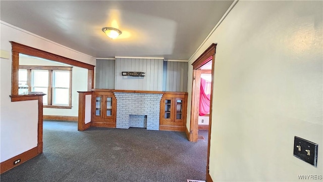 341 Dartmouth Ave, Buffalo, NY 14215 - unfurnished living room featuring carpet floors, baseboards, and a fireplace
