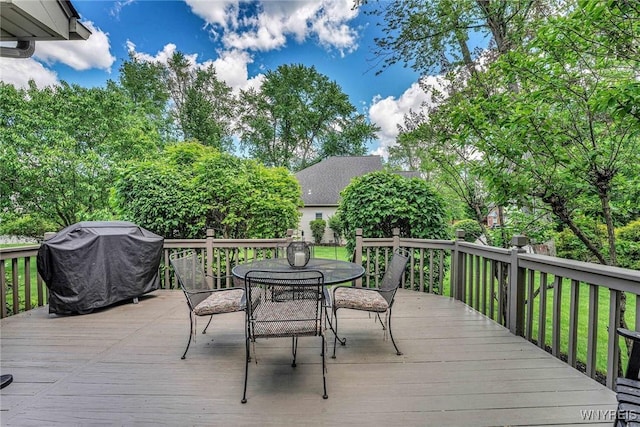 23 Gatehouse Ln, Amherst, NY 14051 - wooden deck with outdoor dining area and grilling area