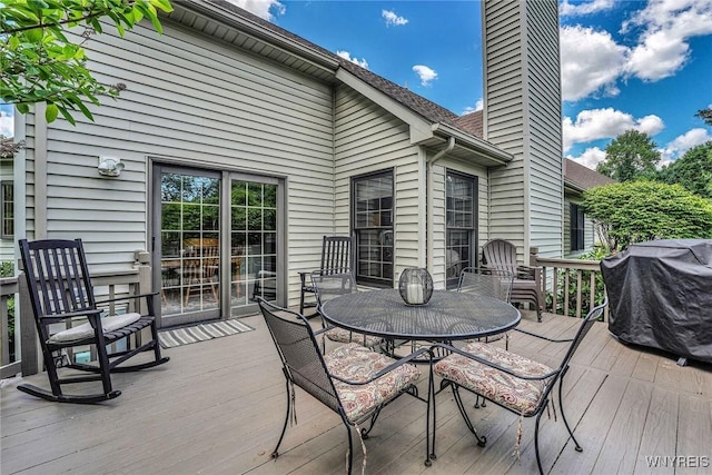 23 Gatehouse Ln, Amherst, NY 14051 - deck with outdoor dining area and area for grilling