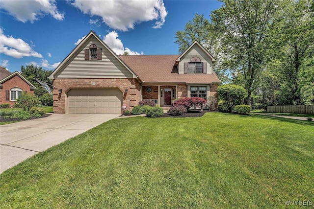 23 Gatehouse Ln, Amherst, NY 14051 - view of front of house with brick siding and driveway