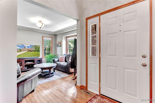 23 Gatehouse Ln, Amherst, NY 14051 - foyer entrance with light wood-style floors and baseboards