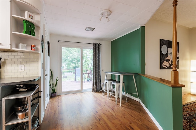 43 Woodland Park, Rochester, NY 14610 - sitting room with crown molding, wood finished floors, and baseboards