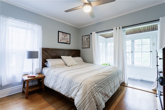 43 Woodland Park, Rochester, NY 14610 - bedroom featuring wood finished floors, ornamental molding, ceiling fan, and baseboards