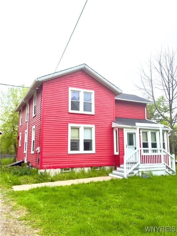 6723 Akron Rd, Lockport Town, NY 14094 - back of property featuring a lawn