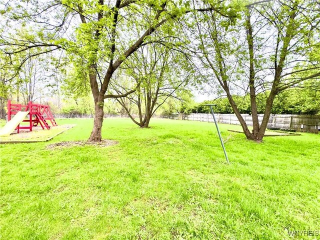 6723 Akron Rd, Lockport Town, NY 14094 - view of yard with a playground