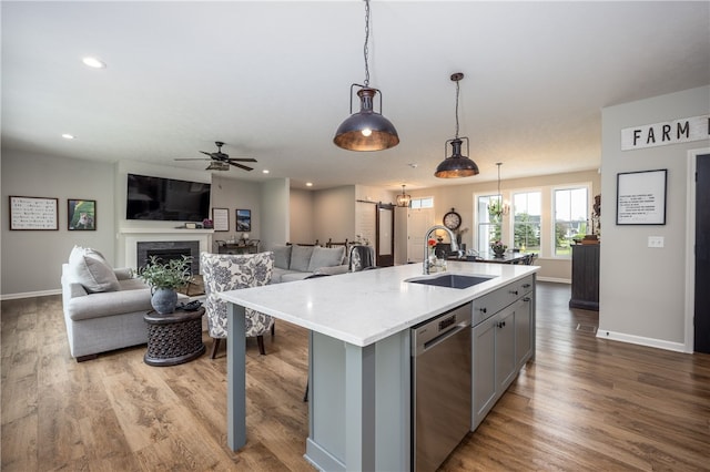 8 Colten Ct, Penfield, NY 14580 - kitchen with gray cabinetry, dishwasher, a sink, baseboards, and recessed lighting