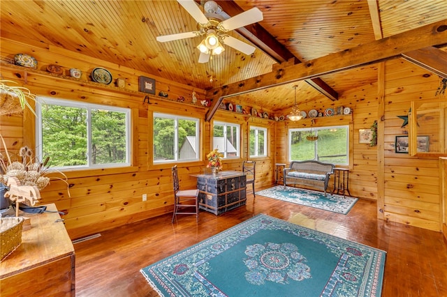 543 Middlefield Rd, Westford, NY 12155 - living area with healthy amount of natural light, hardwood / wood-style floors, wood walls, wood ceiling, and a ceiling fan