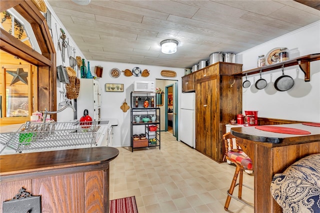 543 Middlefield Rd, Westford, NY 12155 - kitchen featuring white appliances and light floors