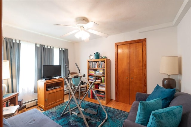 9 N Clinton St, North Dansville, NY 14437 - office space with a ceiling fan, wood finished floors, and baseboard heating