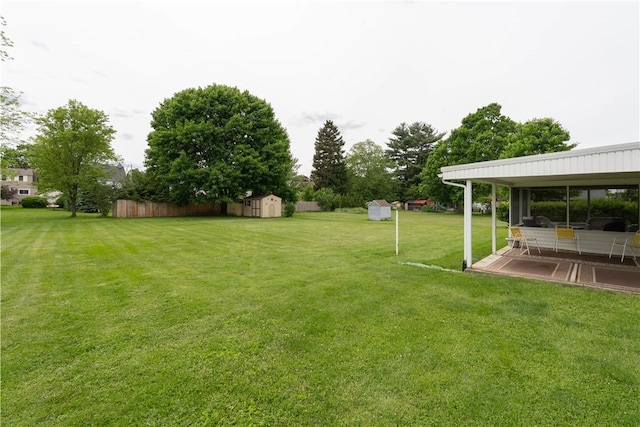 9 N Clinton St, North Dansville, NY 14437 - view of green lawn with a patio