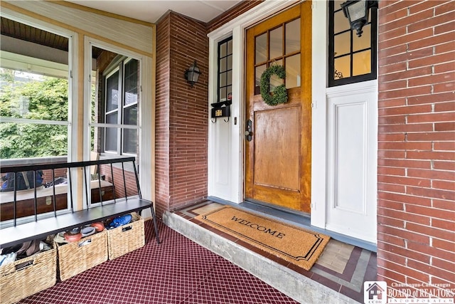 526 Central Ave, Dunkirk-City, NY 14048 - view of exterior entry with a porch and brick siding