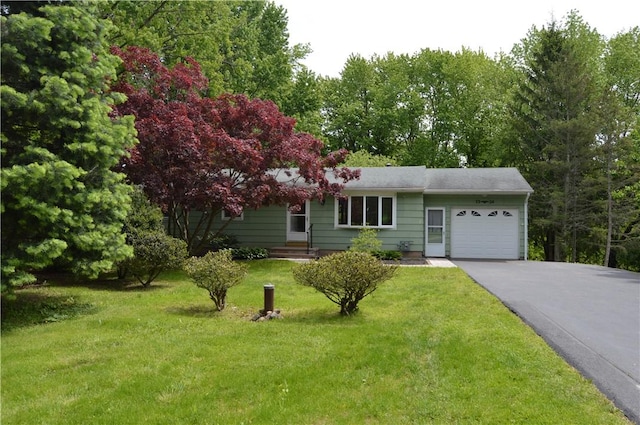 3324 Monroe Wayne County Line Rd, Walworth, NY 14502 - view of front facade featuring an attached garage, driveway, and a front lawn