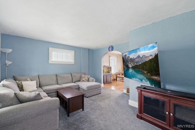 2902 Michigan Ave, Niagara Falls, NY 14305 - living room with arched walkways and carpet