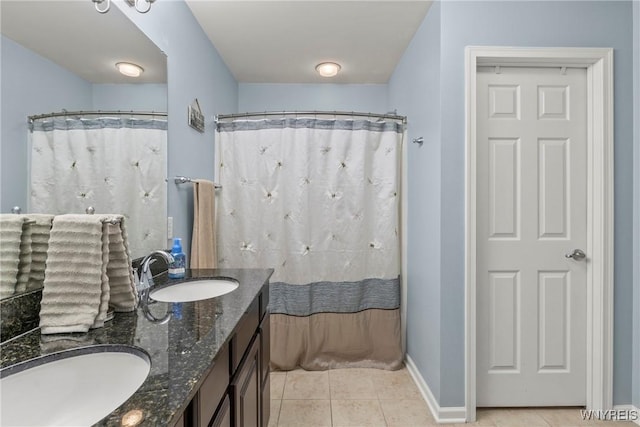52 Apple Blossom Blvd, Lancaster, NY 14086 - full bathroom with tile patterned floors, double vanity, baseboards, and curtained shower