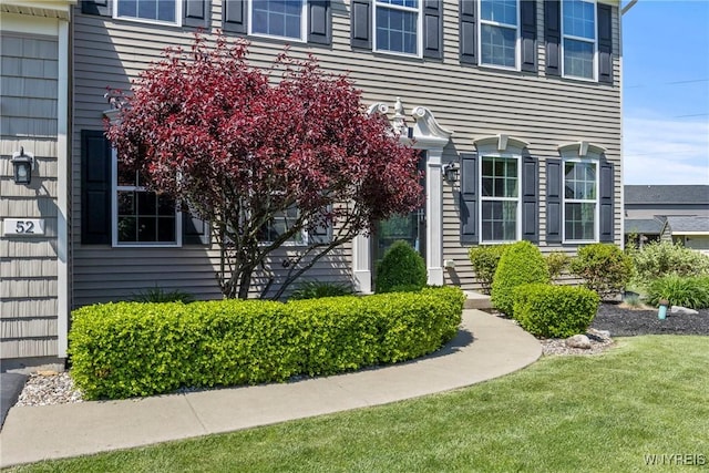 52 Apple Blossom Blvd, Lancaster, NY 14086 - property entrance featuring a lawn