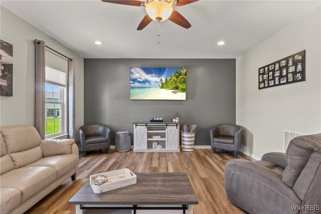 52 Apple Blossom Blvd, Lancaster, NY 14086 - living room with wood finished floors, ceiling fan, recessed lighting, and baseboards
