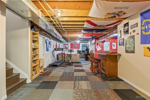 52 Apple Blossom Blvd, Lancaster, NY 14086 - below grade area with carpet floors, baseboards, a bar, and stairs