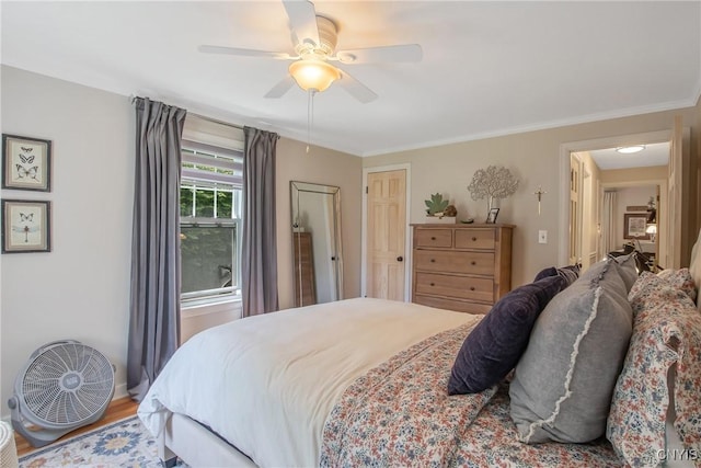 1607 Stolp Ave, Syracuse, NY 13207 - bedroom with a ceiling fan, ornamental molding, and wood finished floors