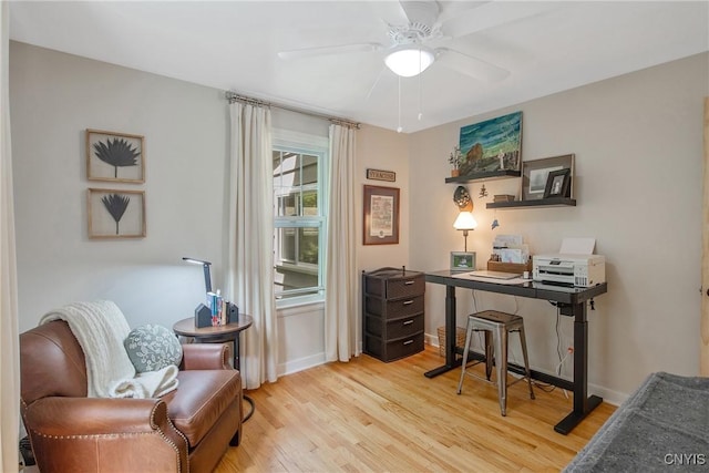 1607 Stolp Ave, Syracuse, NY 13207 - home office with light wood-style flooring, a ceiling fan, and baseboards