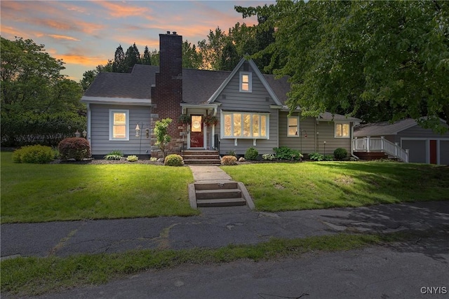 1607 Stolp Ave, Syracuse, NY 13207 - view of front of property featuring a chimney and a yard