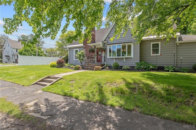 1607 Stolp Ave, Syracuse, NY 13207 - view of front of home with a chimney and a shingled roof