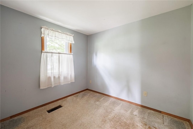 6695 Fisher Rd, Ontario, NY 14589 - carpeted empty room with baseboards