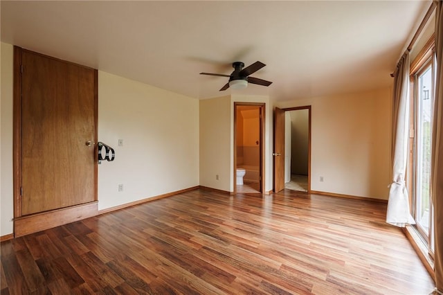 6695 Fisher Rd, Ontario, NY 14589 - unfurnished bedroom featuring light wood-style floors, baseboards, a ceiling fan, and connected bathroom