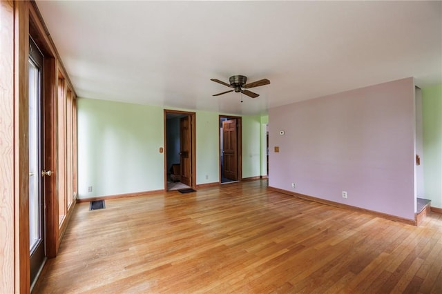 6695 Fisher Rd, Ontario, NY 14589 - empty room with light wood-type flooring, baseboards, and a ceiling fan