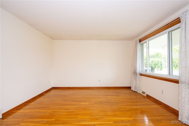 4314 Elmwood Ave, Hamburg, NY 14219 - unfurnished room with light wood-style floors and baseboards
